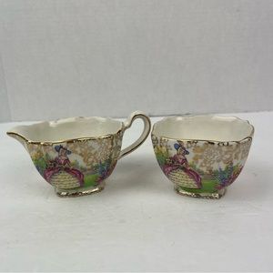 Vintage Elijah Cotton-ltd Nelson Ware cream and sugar set w/floral & lady